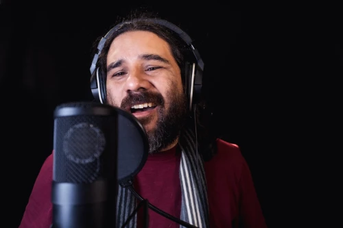 view-of-a-hispanic-man-with-beard-wearing-a-scarf-2025-02-02-21-18-54-utc
